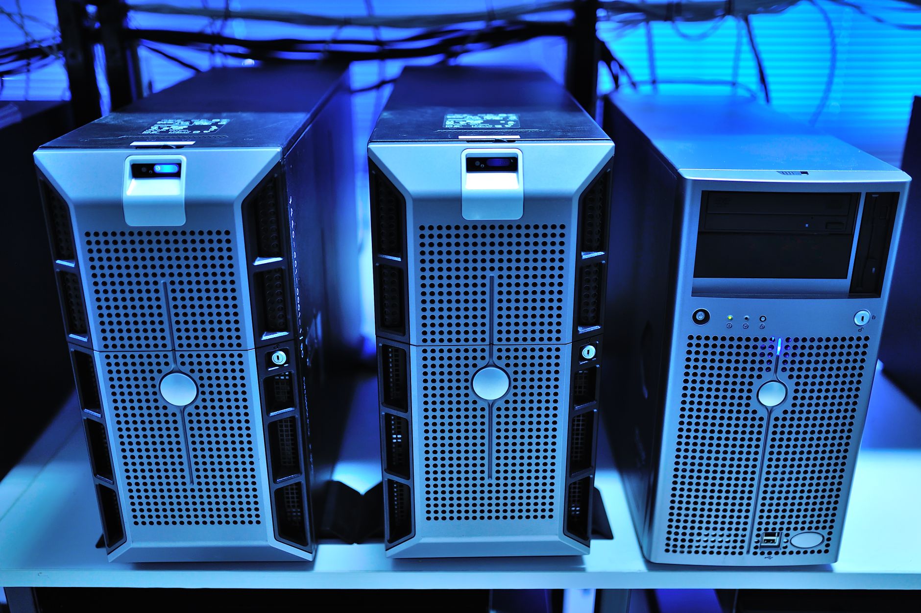Business technology team comparing on-premise servers and cloud infrastructure costs